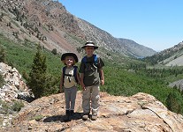 Kids make faces while being photographed in nature