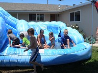 Kids queuing up for the water slide