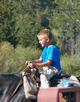 Tom on a horse.