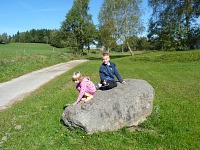 Kids on a rock.