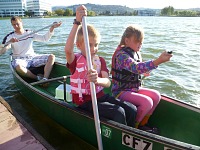 Tom on a boat with Anička.