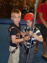 Tom helping Daniel with knots.