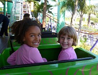 Margo and Lisa on a roller-coaster.
