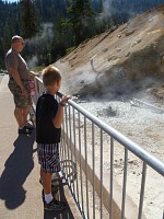 A fumerole encroaching the roadway. A fumerole encroaching the roadway.