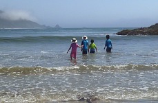 Kids in the surf on Molera Beach