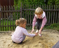Every age category likes to play in the sandbox.