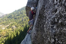 Pavel lodges a cam at the beginning of the overhang in the third pitch. Pavel lodges a cam at the beginning of the overhang in the third pitch.