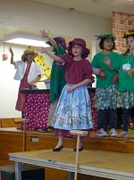 Lisa in her school play, cast as the Red Riding Hood's grandmother. Lisa in her school play, cast as the Red Riding Hood's grandmother.