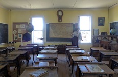 The teacher in this historic classroom seems to be collapsing. The teacher in this historic classroom seems to be collapsing.