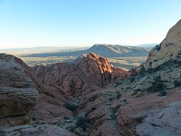 A view from a ridge above the pool - Red Rock(s) front and center, Las Vegas behind. A view from a ridge above the pool - Red Rock(s) front and center, Las Vegas behind.