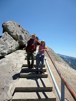 Tom and Lisa take a pose on the stairs of Morro Rock.