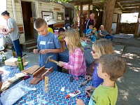 Bear Creek children put together houses for endangered bats. Bear Creek children put together houses for endangered bats.