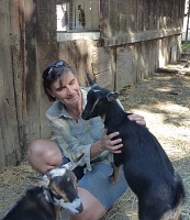 Carol and our two goats. Carol and our two goats.
