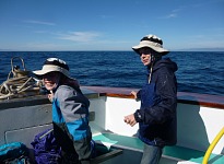 Kids on the prow of our whaling boat. Kids on the prow of our whaling boat.