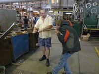 Blowing glass is quite a workout. Blowing glass is quite a workout.