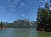 Shasta Caverns are located in a limestone hill on the other side of the reservoir. Shasta Caverns are located in a limestone hill on the other side of the reservoir.