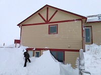 Snow bank in front of our basement. Snow bank in front of our basement.