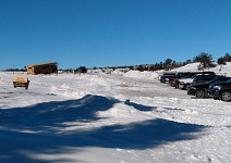 This time the school bus is only stuck in a ditch and does not block the parking access.