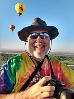 I'm taking a picture of Sid in the basket of a flying balloon! I'm taking a picture of Sid in the basket of a flying balloon!