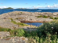 Mandal: a speedboat by Sjøsanden.