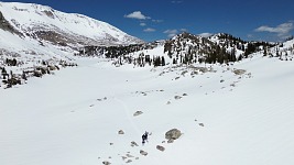 The meadow in background is a frozen lake.