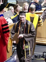 Hand shaken, diploma voucher received.